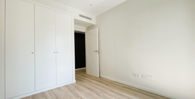 PLANTA BAIXA D'OBRA NOVA AMB 2 HABITACIONS, JARDÍ PRIVAT DE 90M2, PÀRQUING I ZONA COMUNITARIA AMB PISCINA A DOMENY - GIRONA 