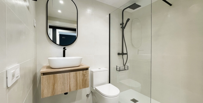 PLANTA BAIXA D'OBRA NOVA AMB 2 HABITACIONS, JARDÍ PRIVAT DE 90M2, PÀRQUING I ZONA COMUNITARIA AMB PISCINA A DOMENY - GIRONA 