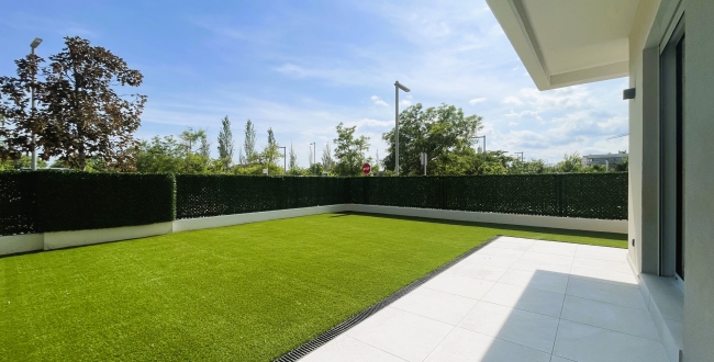 PLANTA BAIXA D'OBRA NOVA AMB 2 HABITACIONS, JARDÍ PRIVAT DE 90M2, PÀRQUING I ZONA COMUNITARIA AMB PISCINA A DOMENY - GIRONA 